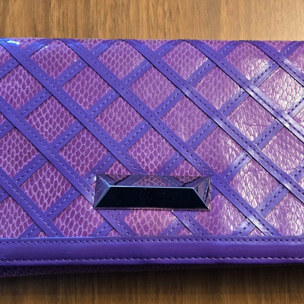White House Black Market purple clutch with chain strap